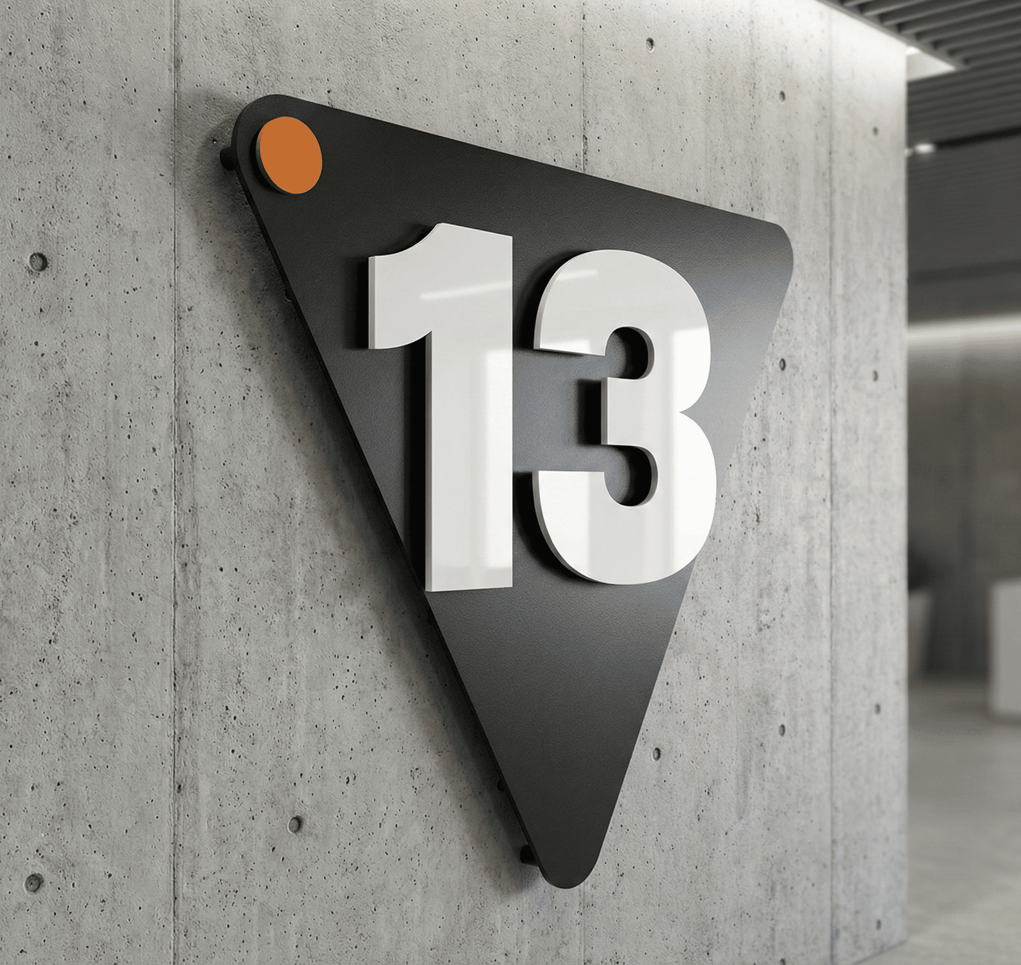 13 Integra brand mark installed on a concrete wall